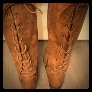Knee high lace up boots